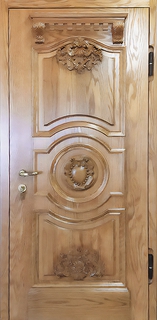 Термодверь из массива с объемной резьбой